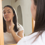 Woman applying cream